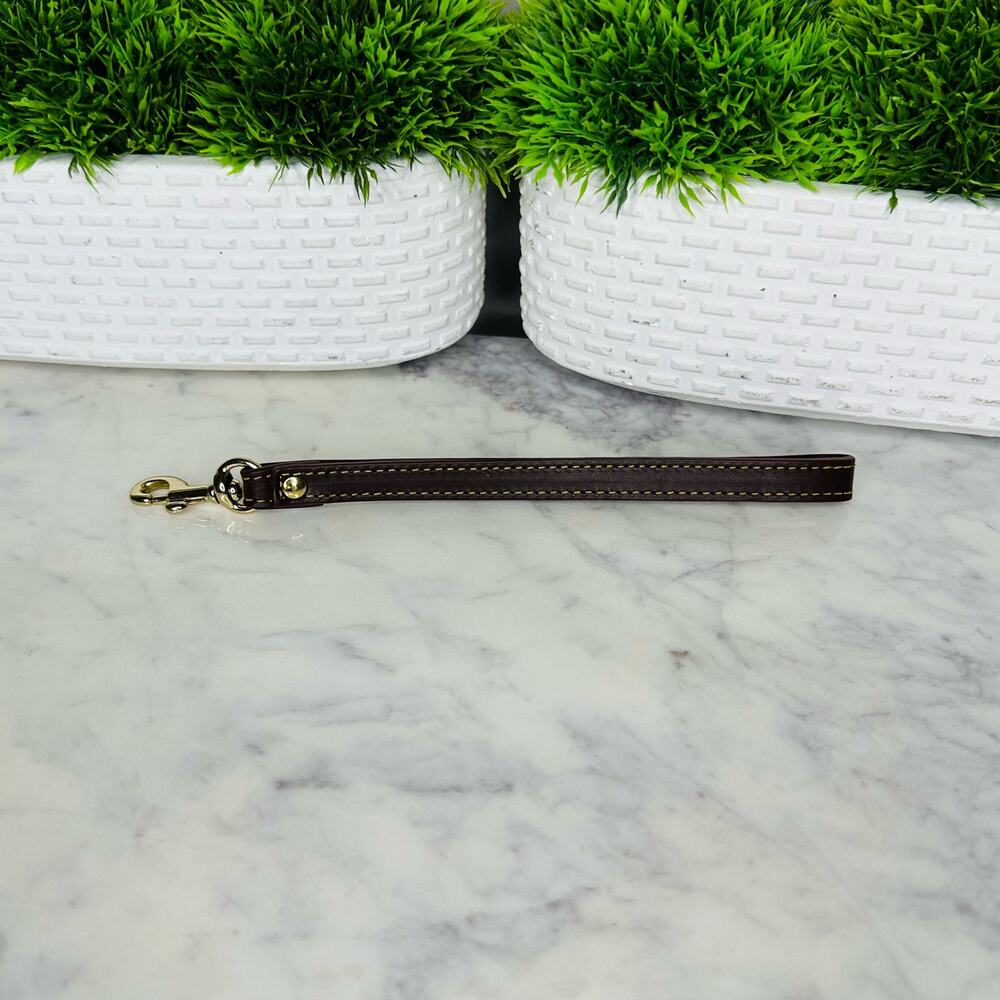 Dooney and Bourke Chestnut wristlet strap